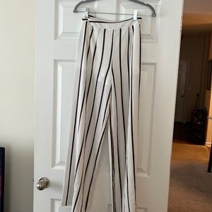 Flare pants with built in liner. The pants are semi sheer.